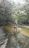 Bella with her human in the creek!